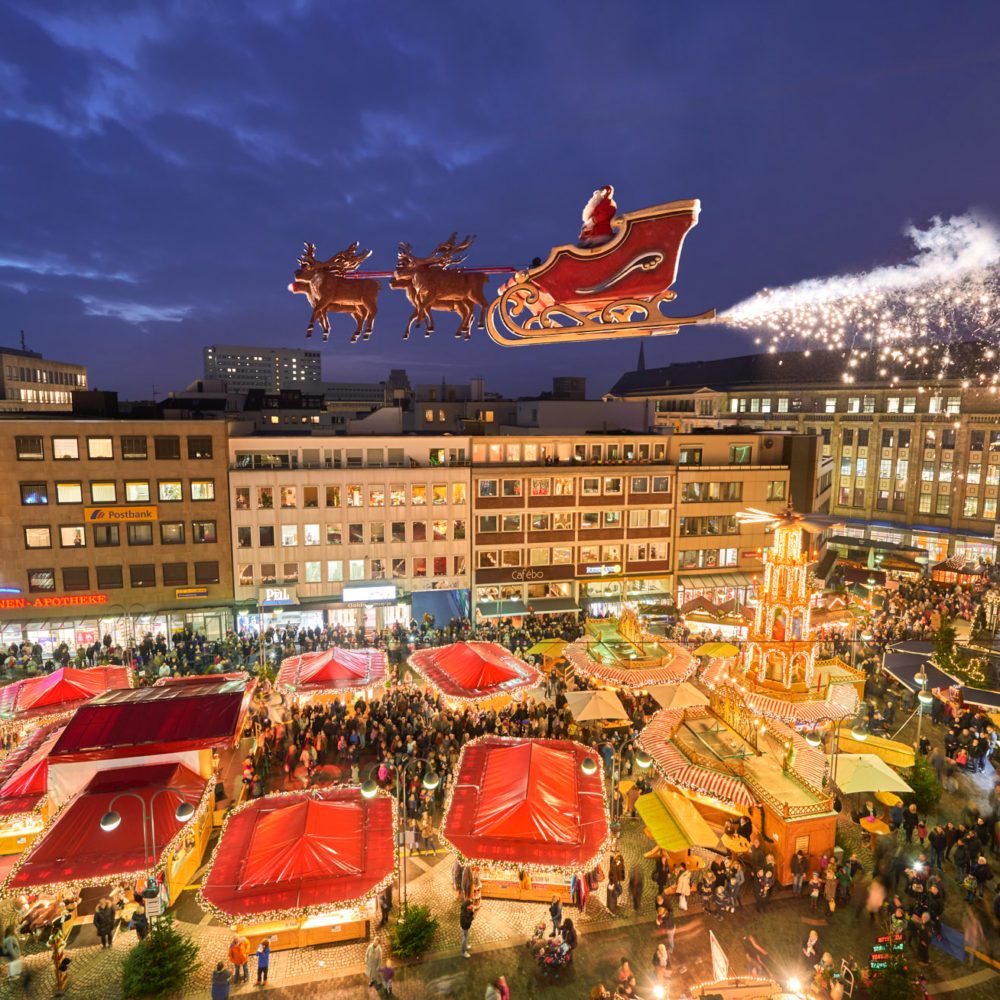 Das Foto zeigt den fliegenden Weihnachtsmann auf dem Weihnachtsmarkt Bochum